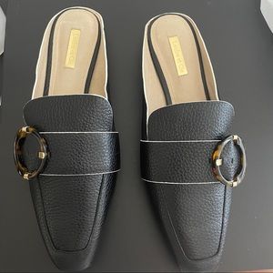 Black and white loafers